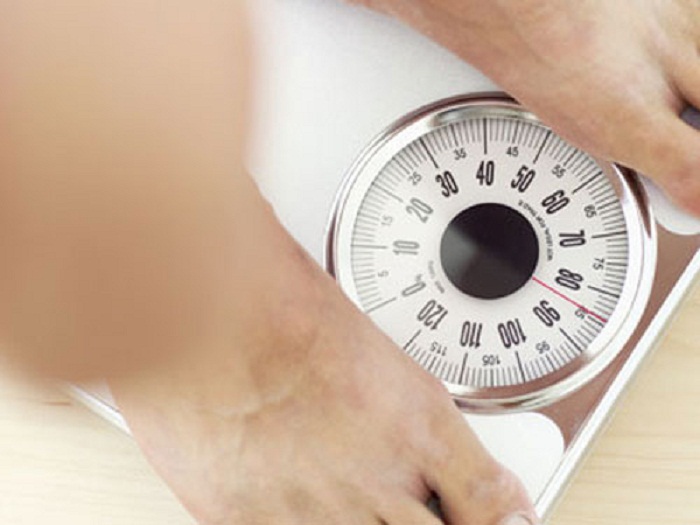 Why do men gain weight in their bellies?